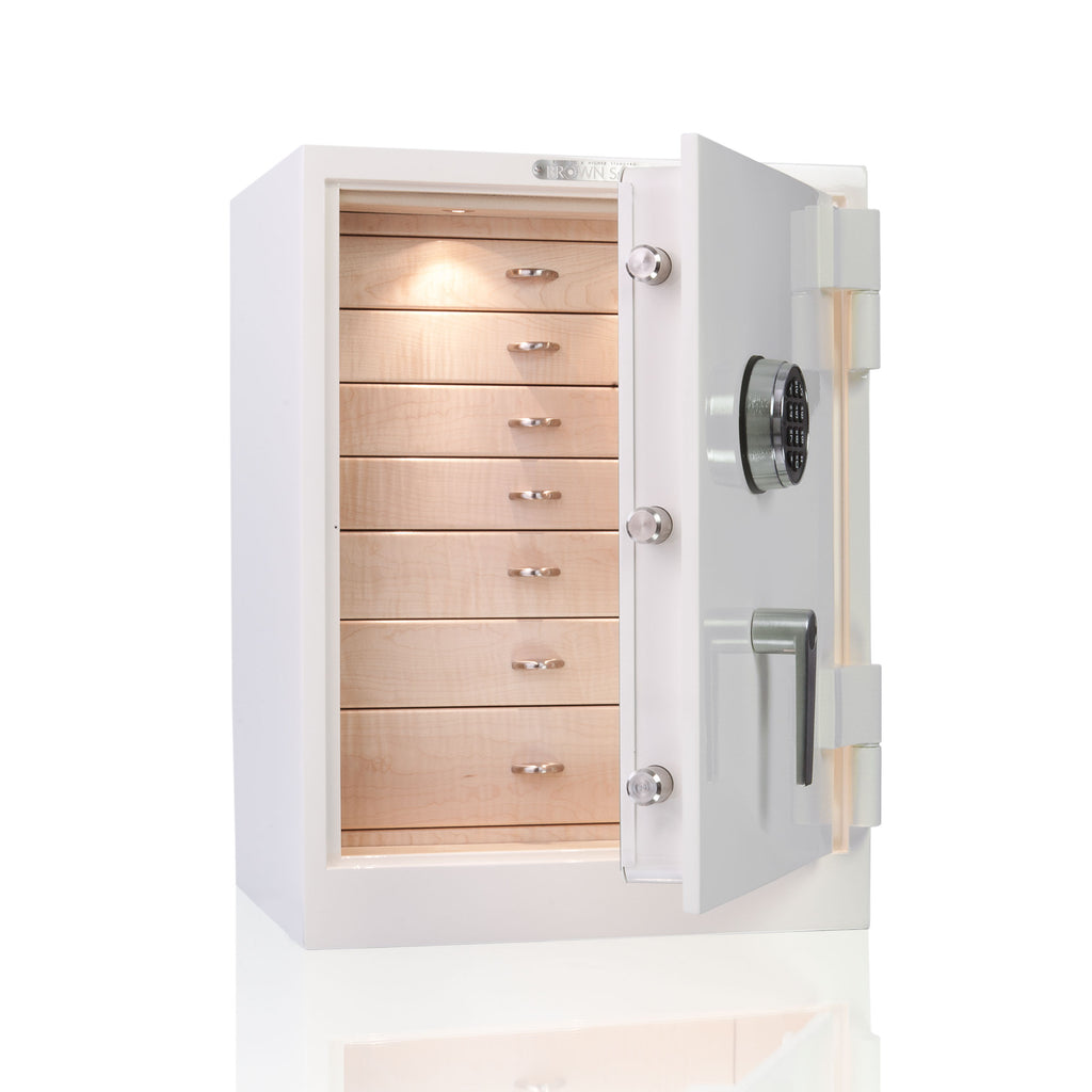 A compact white jewelry safe with a digital keypad and key lock on the front.